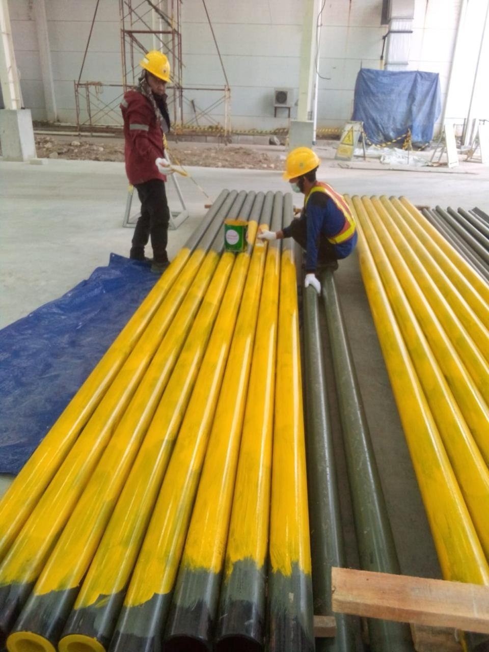 Yellow gas pipes laid out before installation