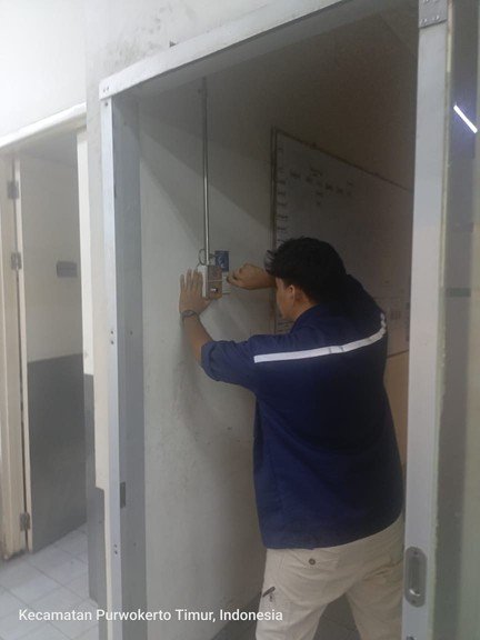 Technician installing a system